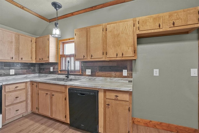 kitchen featuring vaulted ceiling, dishwasher, a sink, light countertops, and light wood-style flooring