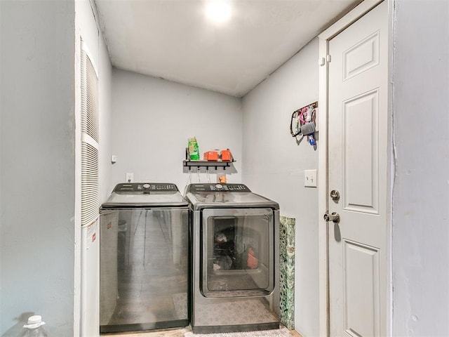 laundry room featuring laundry area and washer and clothes dryer