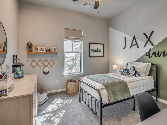 bedroom with visible vents, carpet, and baseboards