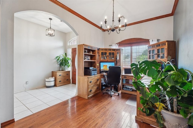 116 Mission Hills Dr, Guthrie, OK 73044 - home office with arched walkways, a chandelier, wood finished floors, and crown molding
