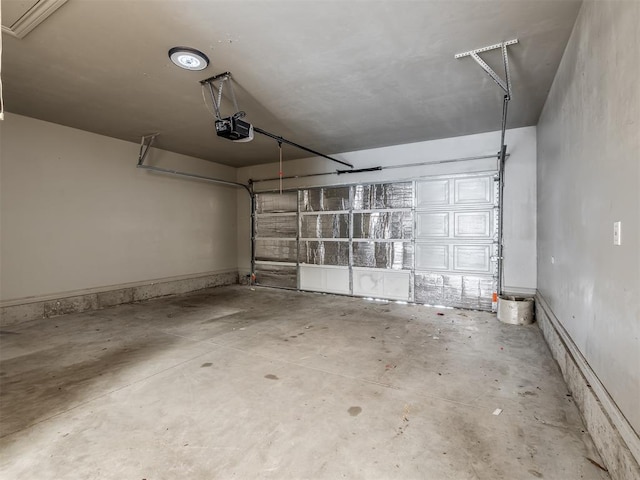 garage featuring a garage door opener