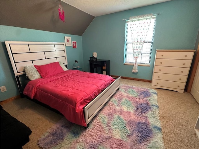 carpeted bedroom with baseboards, a textured ceiling, and vaulted ceiling