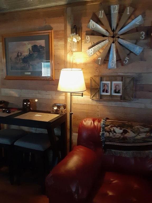 interior space featuring wood walls