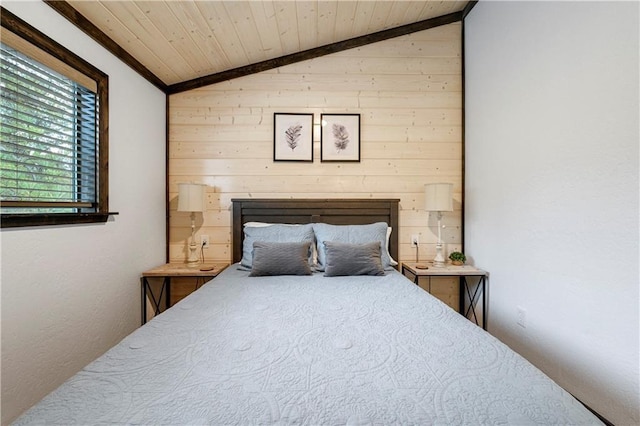bedroom featuring lofted ceiling, wooden walls, and wood ceiling