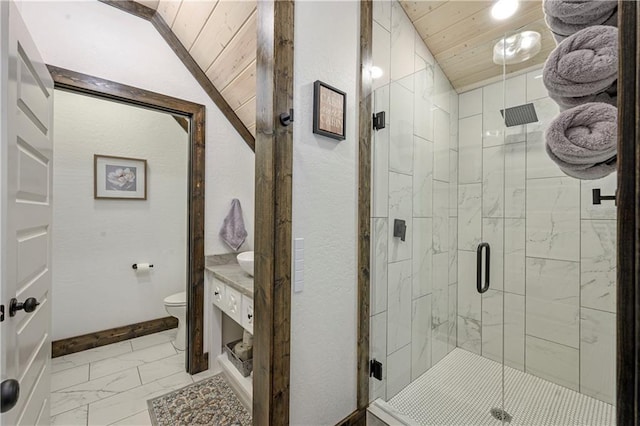 bathroom with a stall shower, wooden ceiling, toilet, marble finish floor, and vaulted ceiling