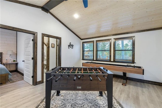 recreation room featuring wood ceiling, wood finished floors, baseboards, and vaulted ceiling with beams