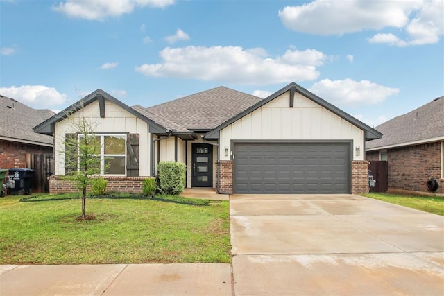 ranch-style home with a shingled roof, brick siding, a garage, a front yard, and concrete driveway