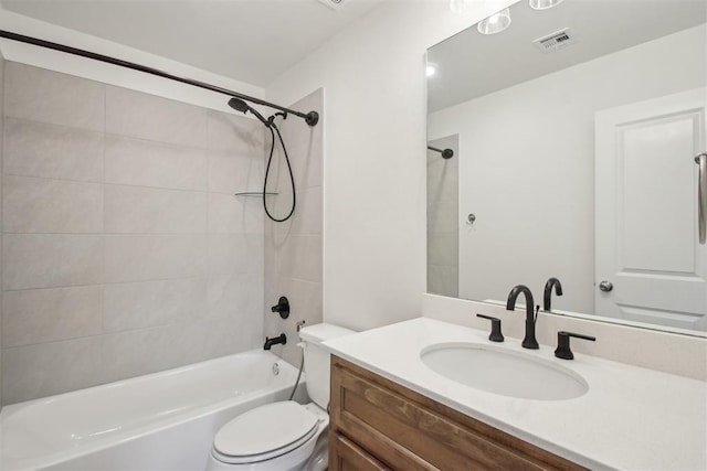 bathroom with toilet,  shower combination, visible vents, and vanity