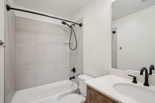 bathroom featuring toilet, visible vents, shower / tub combination, and vanity