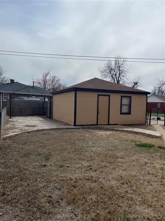 view of outbuilding with a fenced backyard