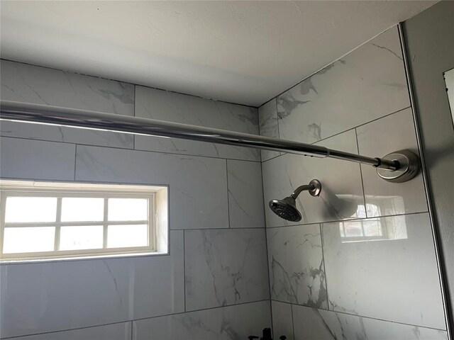 room details with a tile shower
