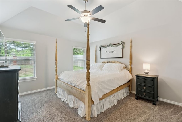 bedroom featuring baseboards, multiple windows, and carpet