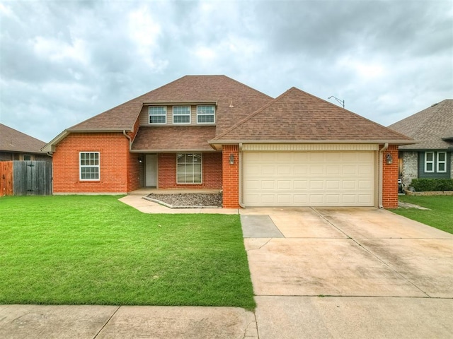 traditional-style home featuring brick siding, driveway, and fence