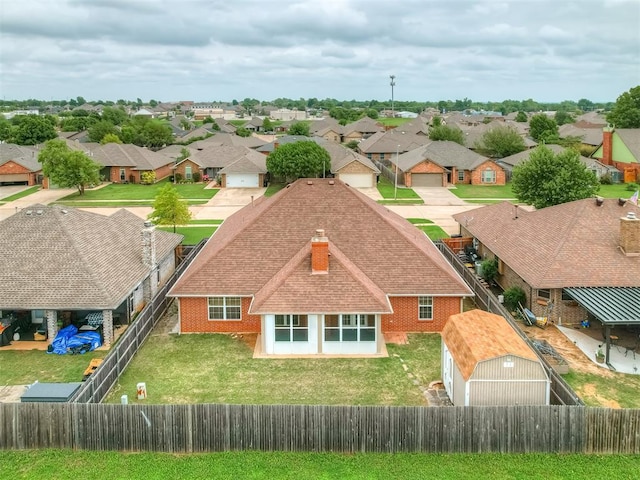 drone / aerial view with a residential view