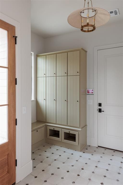 6509 NE 97th St, Oklahoma City, OK 73151 - mudroom featuring light floors and plenty of natural light