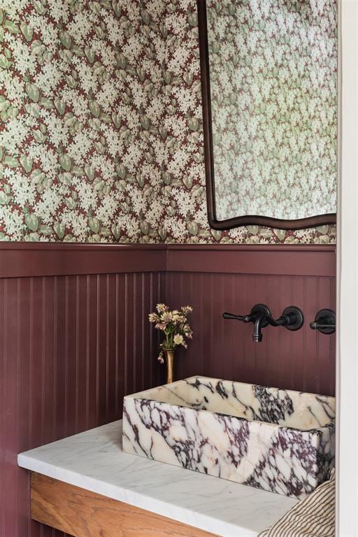 6509 NE 97th St, Oklahoma City, OK 73151 - bathroom with wallpapered walls and a wainscoted wall