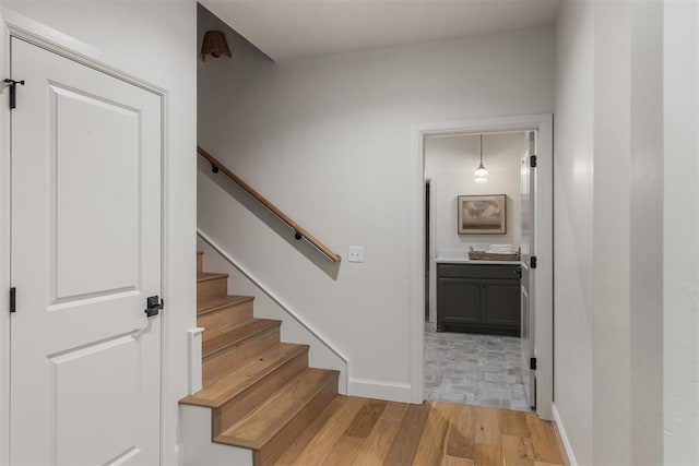 6509 NE 97th St, Oklahoma City, OK 73151 - staircase featuring wood finished floors and baseboards