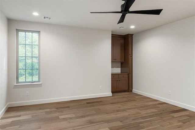 6509 NE 97th St, Oklahoma City, OK 73151 - unfurnished room featuring ceiling fan, light wood-type flooring, and recessed lighting