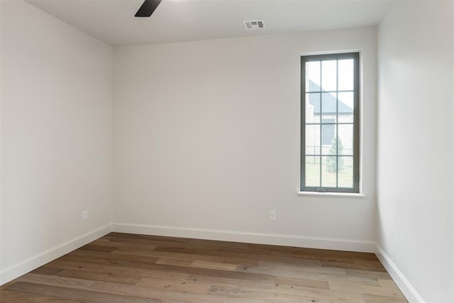 6509 NE 97th St, Oklahoma City, OK 73151 - empty room with ceiling fan and wood finished floors