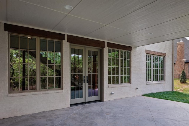 6509 NE 97th St, Oklahoma City, OK 73151 - view of patio / terrace featuring french doors and stairs