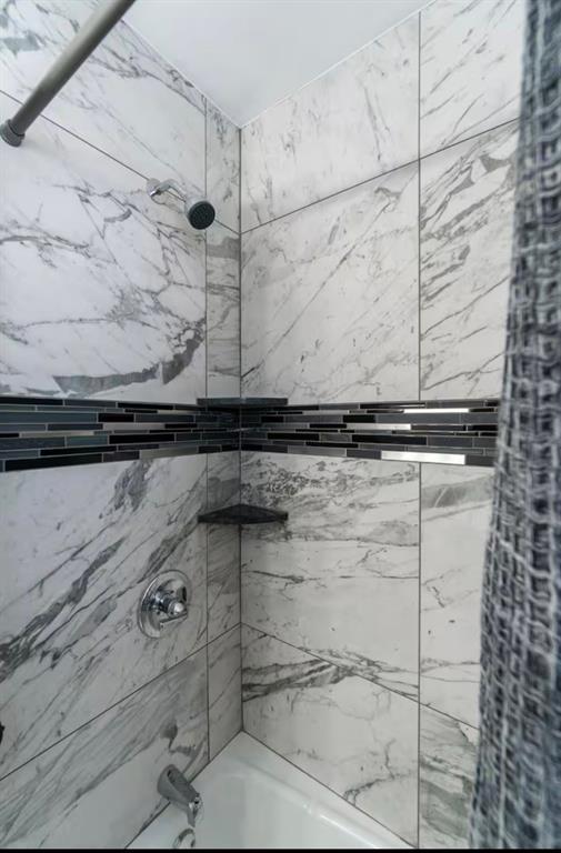 full bathroom featuring shower / tub combination