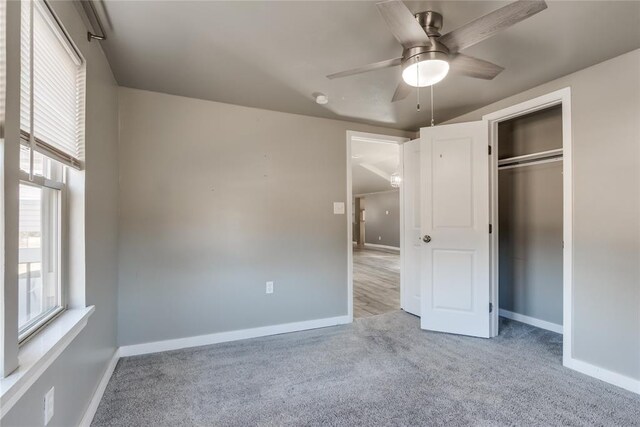 20318 State Highway 39, Purcell, OK 73080 - unfurnished bedroom with carpet floors, baseboards, and multiple windows