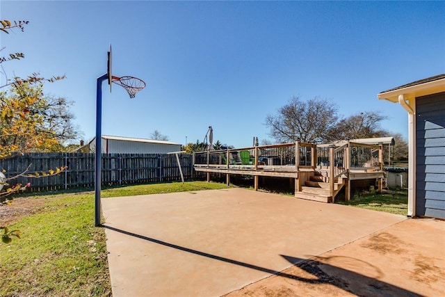 20318 State Highway 39, Purcell, OK 73080 - view of basketball court featuring a lawn and a fenced backyard