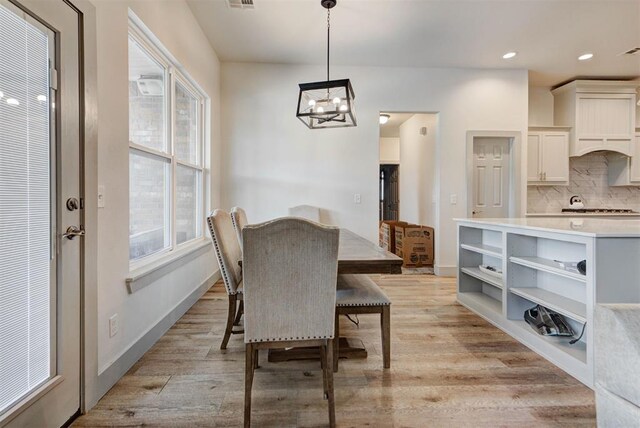 9600 Sultans Water Way, Yukon, OK 73099 - dining area featuring a chandelier, light wood finished floors, baseboards, and recessed lighting
