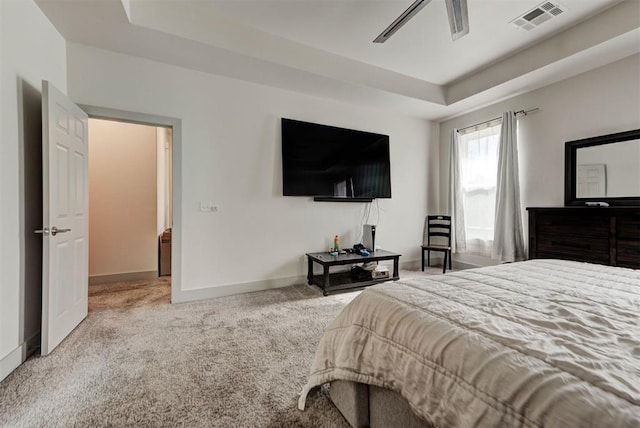 9600 Sultans Water Way, Yukon, OK 73099 - bedroom featuring a raised ceiling, carpet, baseboards, and a ceiling fan