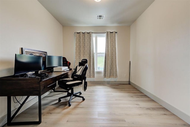 9600 Sultans Water Way, Yukon, OK 73099 - home office with light wood-style flooring and baseboards