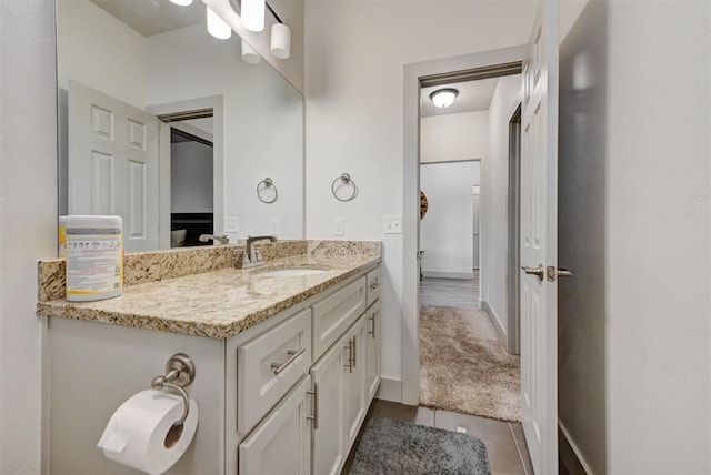 9600 Sultans Water Way, Yukon, OK 73099 - bathroom featuring vanity, tile patterned floors, and baseboards