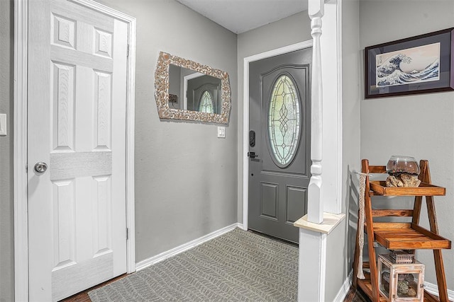 foyer with baseboards