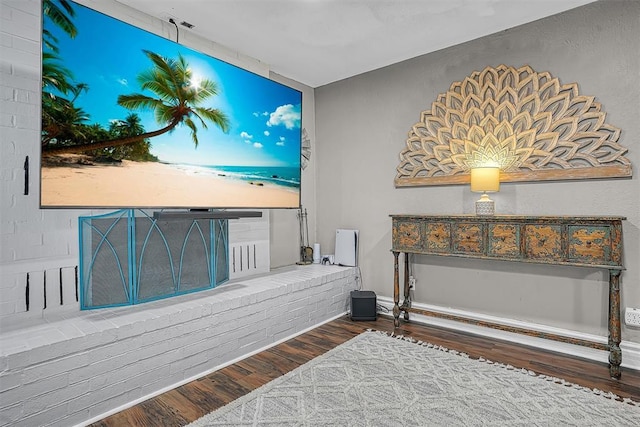 living area with wood finished floors