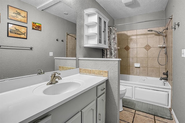 full bathroom featuring a textured wall, shower / bath combo, tile patterned flooring, toilet, and a textured ceiling