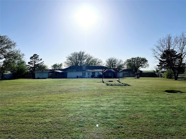 view of yard with fence