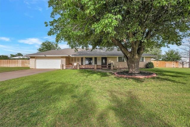 20428 E County Road 1567, Altus, OK 73521 - ranch-style house featuring a porch, an attached garage, driveway, and brick siding