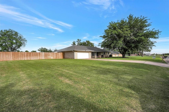 20428 E County Road 1567, Altus, OK 73521 - view of side of property with a garage, driveway, and brick siding