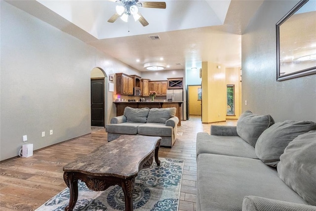 1904 Timber Xing, Yukon, OK 73099 - living area with a ceiling fan, light wood finished floors, and visible vents