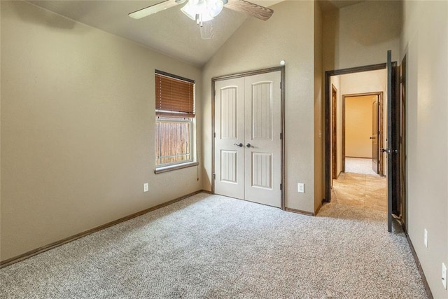 1904 Timber Xing, Yukon, OK 73099 - unfurnished bedroom featuring a closet, lofted ceiling, light carpet, baseboards, and a ceiling fan