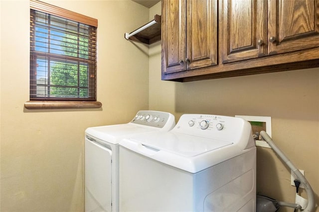 1904 Timber Xing, Yukon, OK 73099 - laundry room with cabinet space and washer and dryer