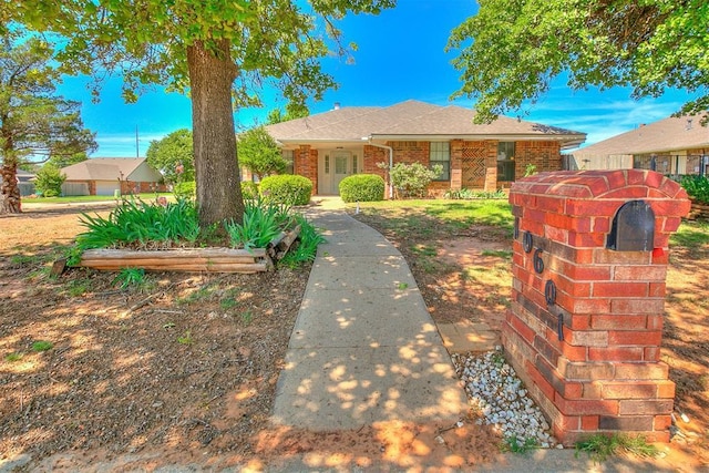 10601 Songbird Ln, Oklahoma City, OK 73130 - view of front of property featuring brick siding