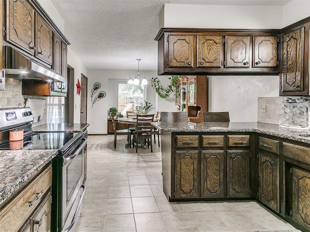 kitchen featuring stainless steel electric range oven, dark brown cabinets, a textured ceiling, and under cabinet range hood