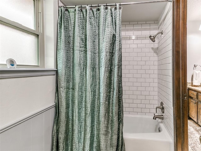 full bathroom with shower / bath combo with shower curtain