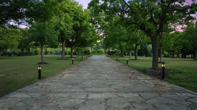 2203 E Wilshire Blvd, Oklahoma City, OK 73111 - surrounding community featuring a yard and view of scattered trees