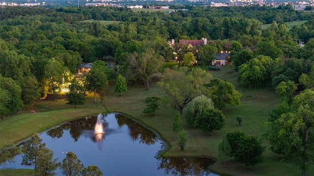 2203 E Wilshire Blvd, Oklahoma City, OK 73111 - aerial view of property and surrounding area featuring a nearby body of water and a heavily wooded area