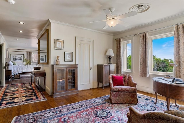 2203 E Wilshire Blvd, Oklahoma City, OK 73111 - sitting room featuring wood finished floors, crown molding, a ceiling fan, baseboards, and recessed lighting