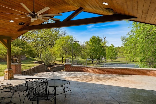 2203 E Wilshire Blvd, Oklahoma City, OK 73111 - view of patio featuring a ceiling fan and outdoor dining space