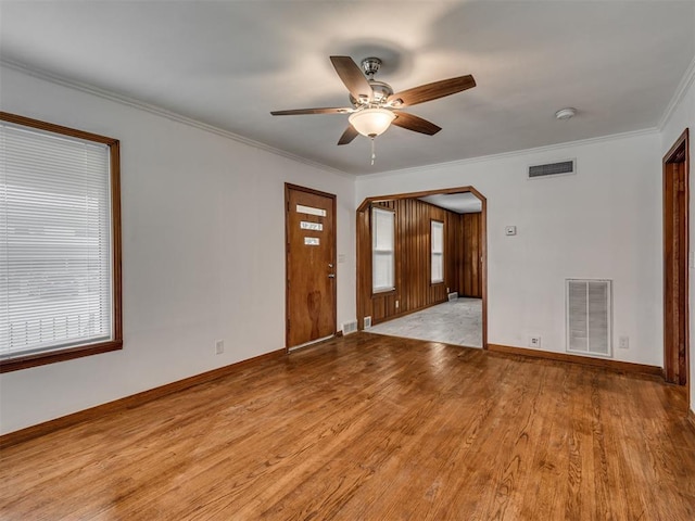 interior space with ceiling fan, visible vents, baseboards, and light wood-style floors