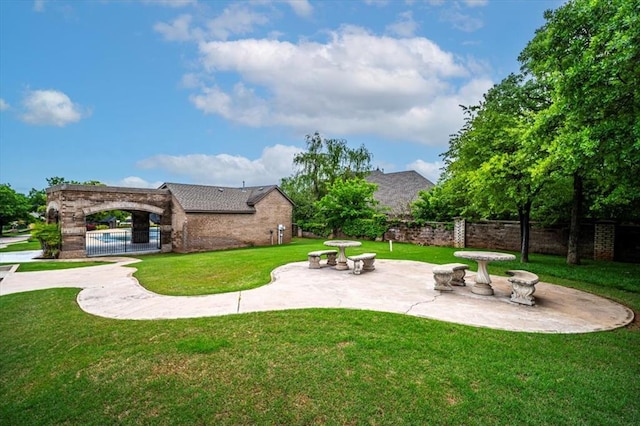 view of yard with a patio and fence