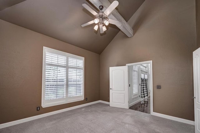 unfurnished bedroom with baseboards, carpet, ceiling fan, and high vaulted ceiling